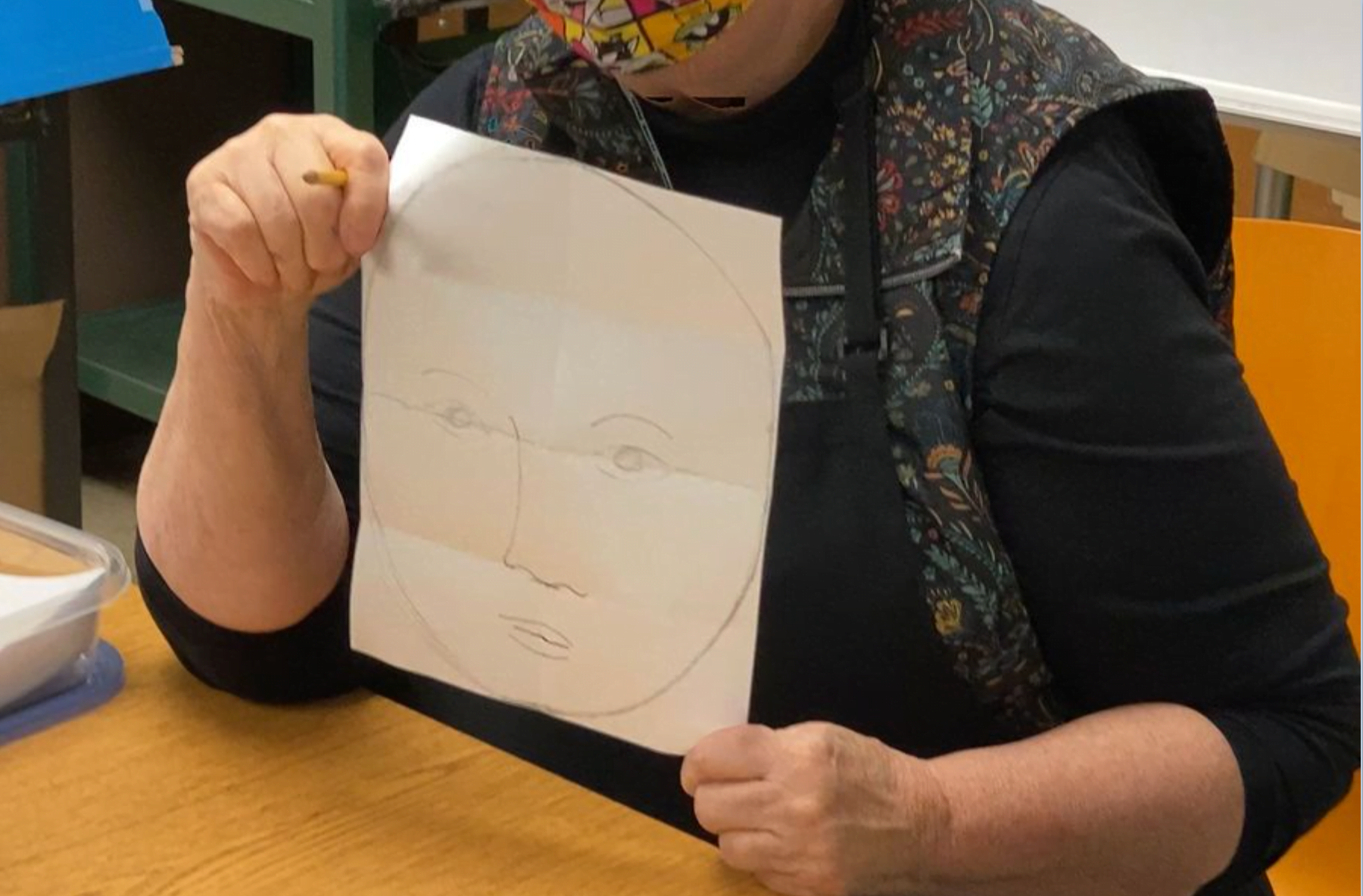 Face drawing tutorial at elementary school in Hillsboro