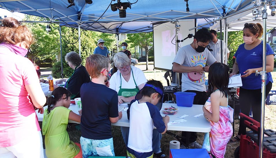 Children enjoying a free art lesson during a live event in Hillsboro