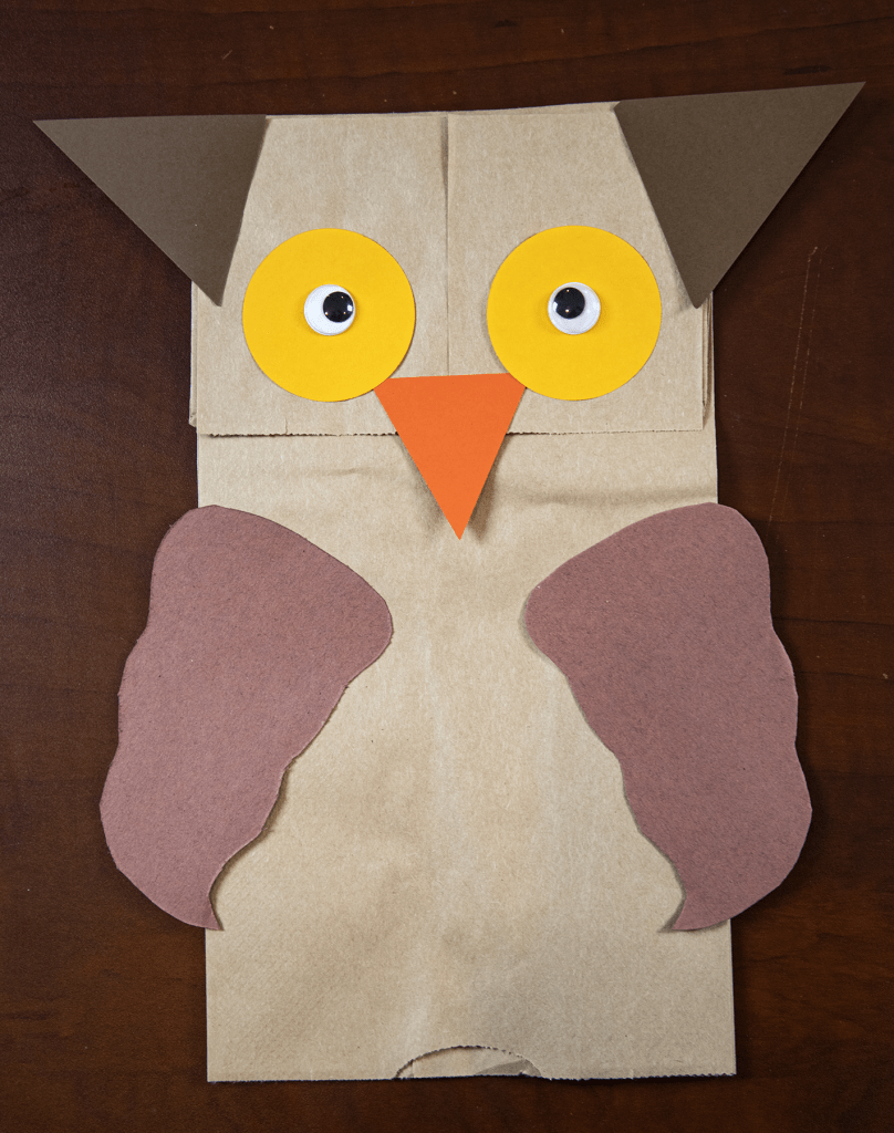 Free art lesson on paper bag puppet construction.