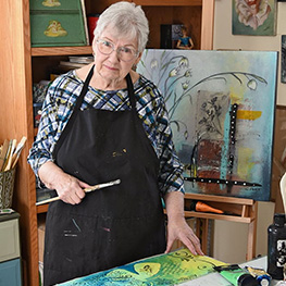 Headshot of Carolyn Pettitt, painter and printmaker influenced by graphic arts.