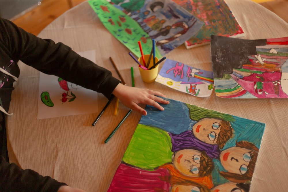 Children expressing their emotions through art.